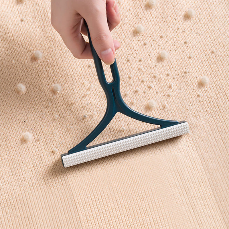 Double-sided manual hair remover