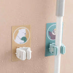 Wall mount for brooms and cleaning tools