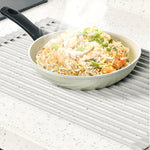 Space-saving stainless steel rolling shelf for the kitchen