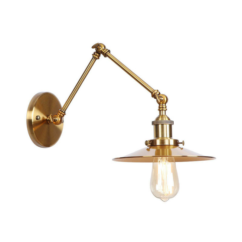 Elegant brass wall lamp with swivel arms and shade
