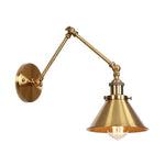 Elegant brass wall lamp with swivel arms and shade