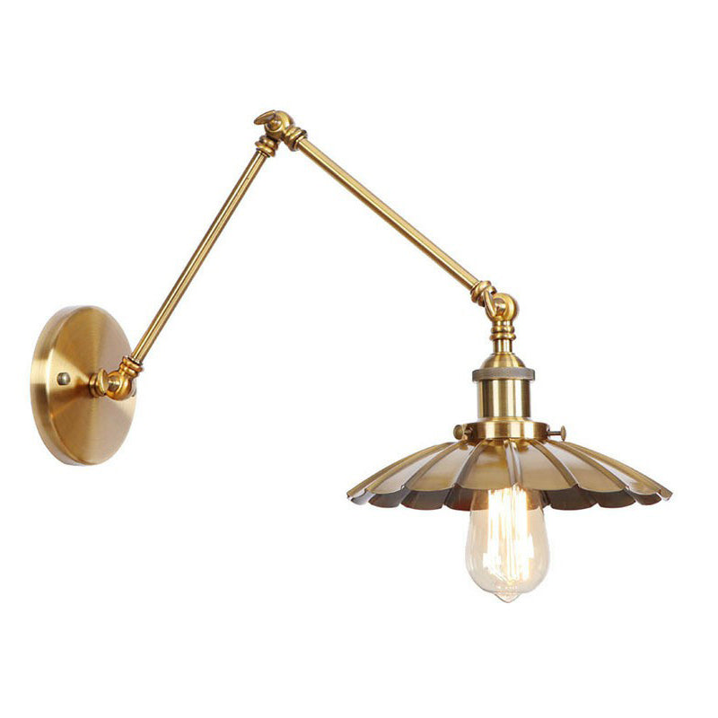 Elegant brass wall lamp with swivel arms and shade