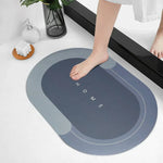 Non-slip oval bath mat with high absorbency