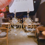 Drei-Ringe Ohrringe mit Kristall-Lotus
