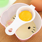 Egg separator for whites and yolks