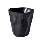 Elegant waste paper bin in modern paper design