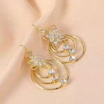 Drei-Ringe Ohrringe mit Kristall-Lotus
