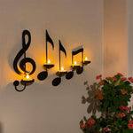 Wandlampe mit schwarzer Musiknote