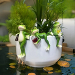 Playful frog figure for flower pots and garden