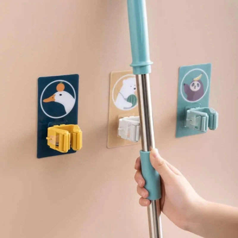 Wall mount for brooms and cleaning tools