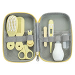 Baby care set with nail clippers, fever thermometer, brush, and comb