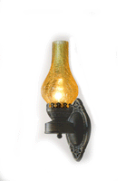 Antique iron wall lamp with glass shade in bronze