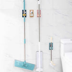 Wall mount for brooms and cleaning tools