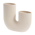 Elegant beige floral vase with a unique design