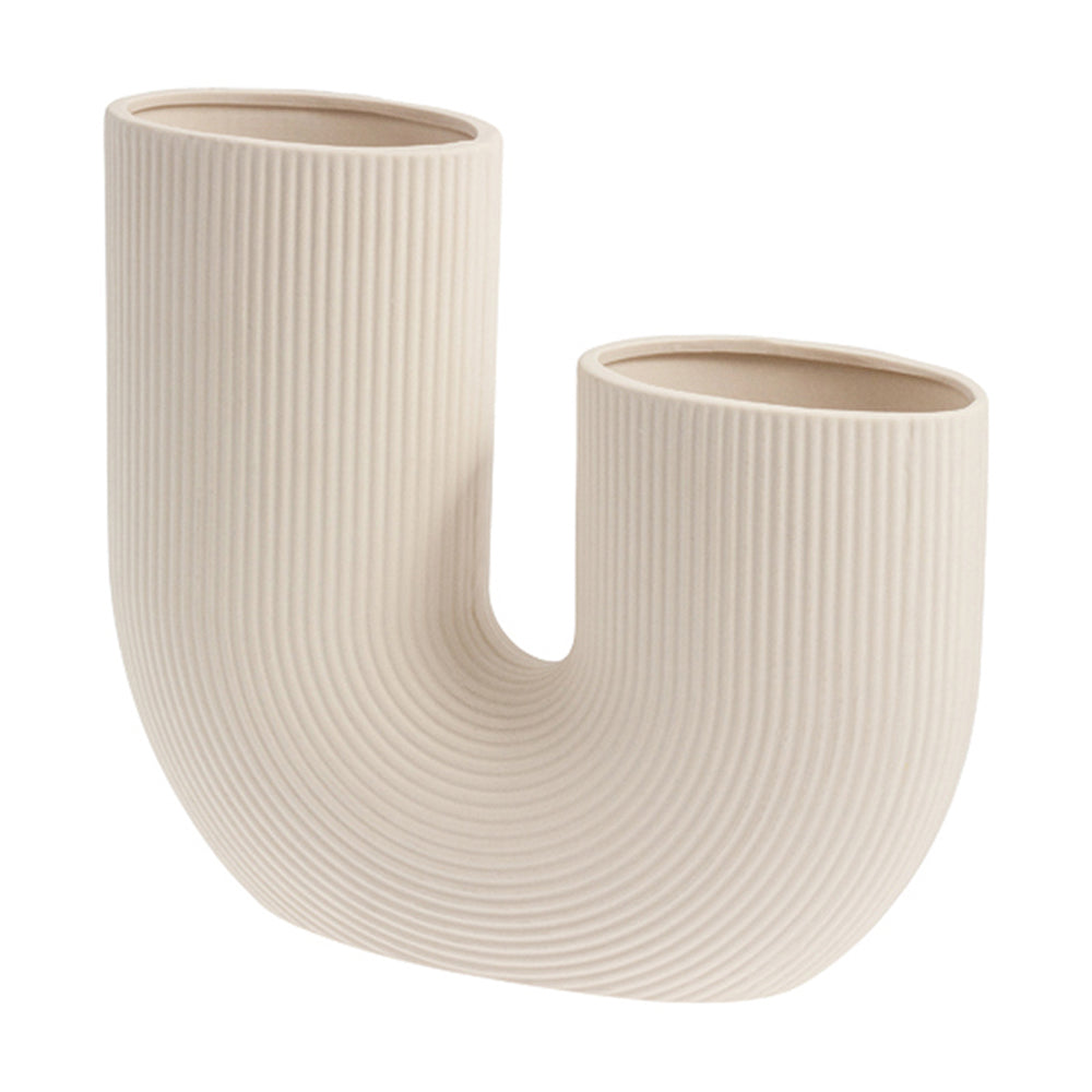 Elegant beige floral vase with a unique design