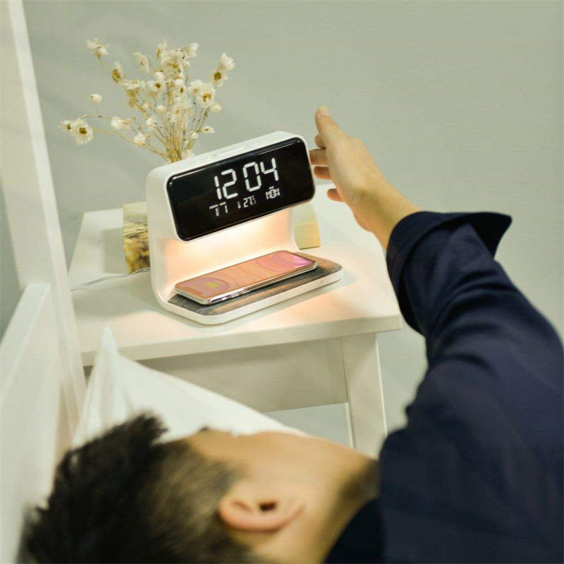 Multifunctional bedside lamp with charging function and clock