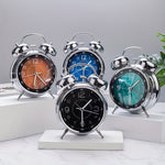 Classic metal alarm clock with bell top for punctual awakening