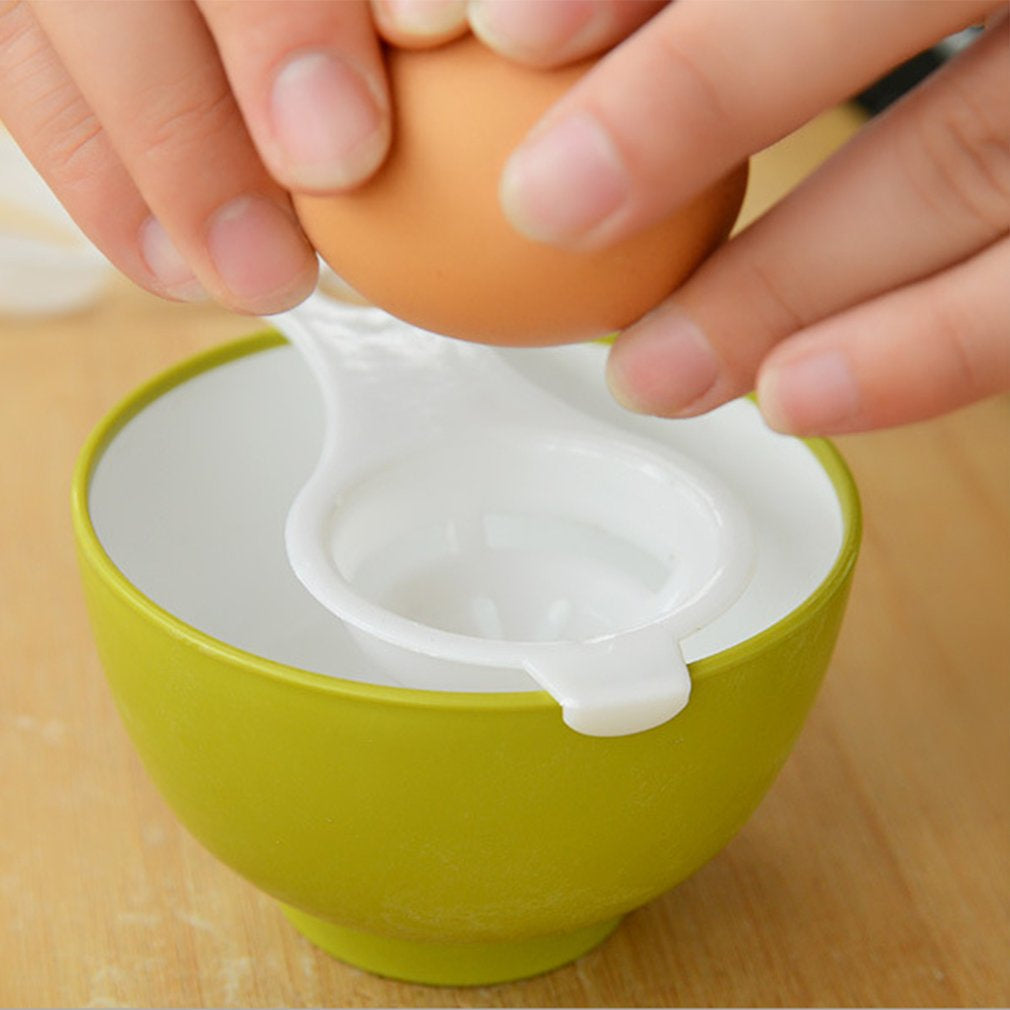Egg separator for whites and yolks