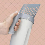 Self-cleaning cat litter box with integrated bag dispenser
