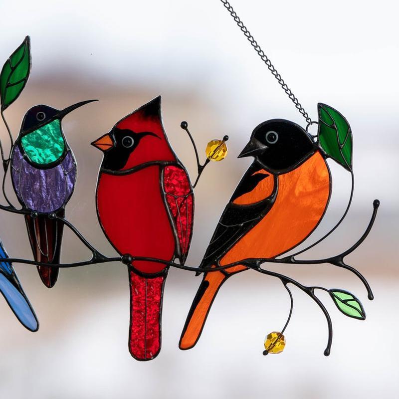 Colorful stained-glass window hangings with bird motif