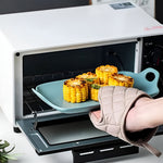 Heat-resistant kitchen gloves with silicone padding