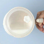 Drinking cup for children with integrated straw