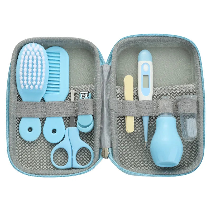 Baby care set with nail clippers, fever thermometer, brush, and comb