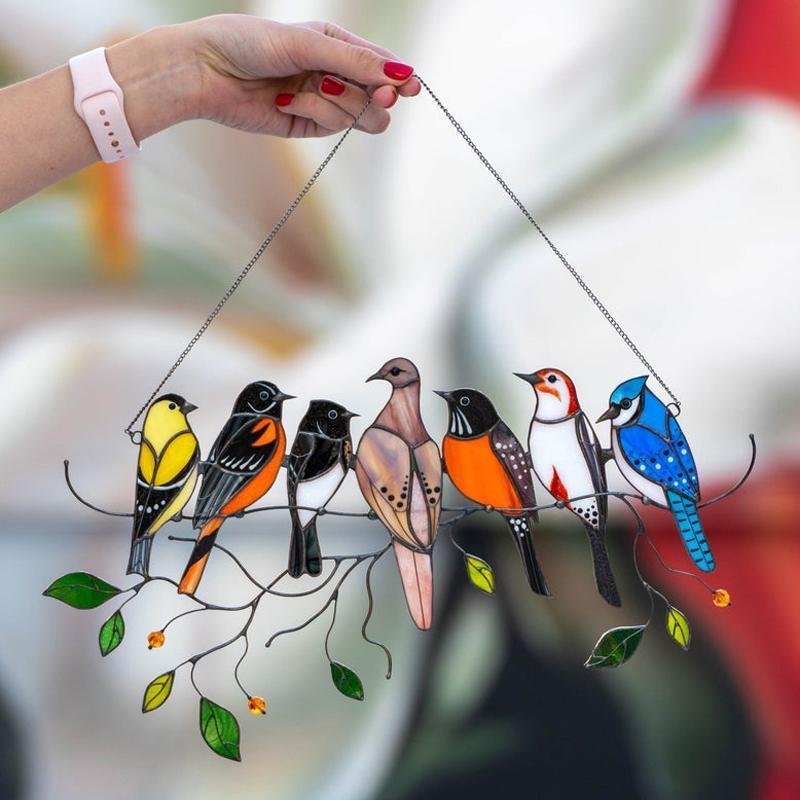 Colorful stained-glass window hangings with bird motif