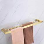 Elegant bathroom set with golden towel holders