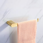 Elegant bathroom set with golden towel holders