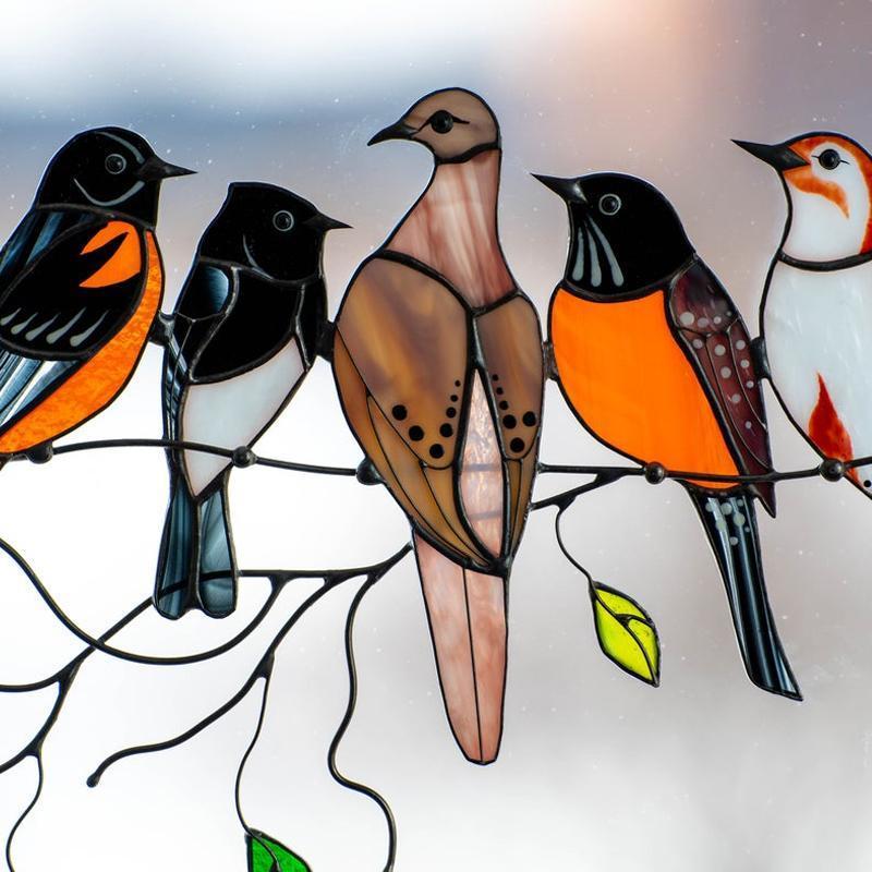 Colorful stained-glass window hangings with bird motif