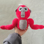 Plush toy of a colorful monkey