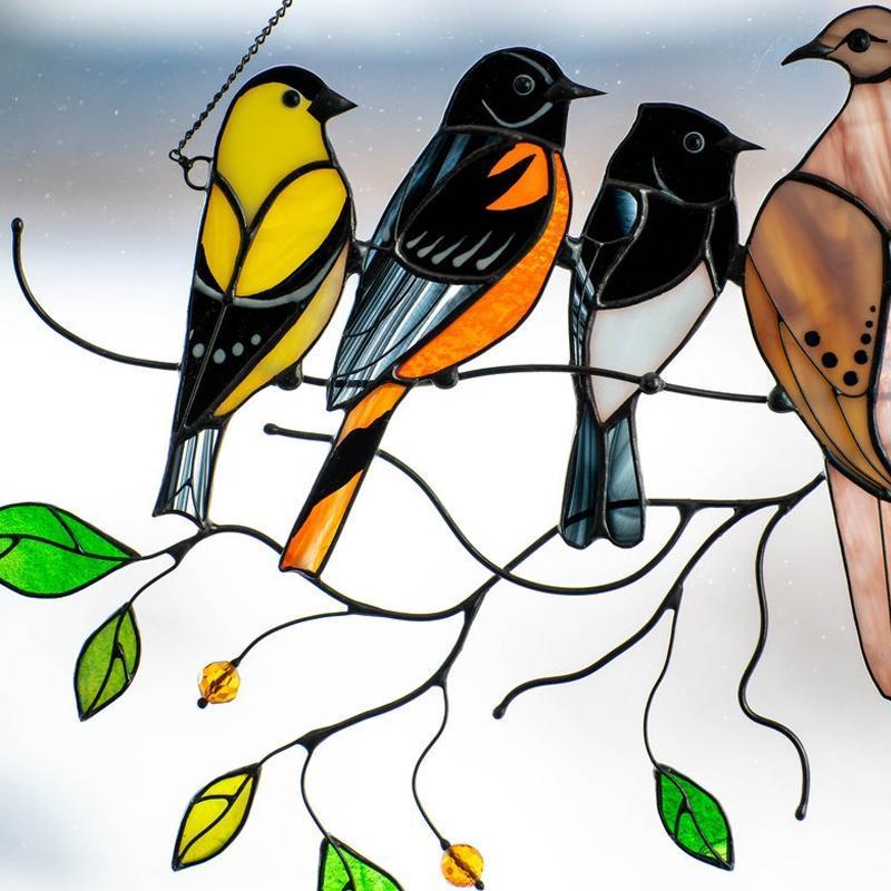 Colorful stained-glass window hangings with bird motif