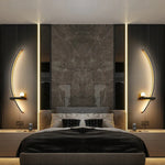Modern LED wall light with curved design and light modes