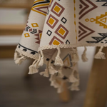 Elegant ethnic tablecloth with stylish tassels