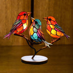 Buntglas Ornamente mit Vögeln auf Ästen
