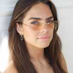 Modern rimless sunglasses with angular lenses