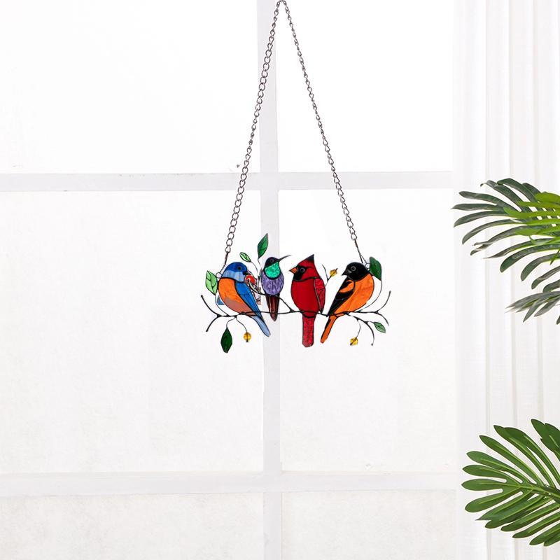 Colorful stained-glass window hangings with bird motif