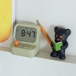 Retro gaming console with alarm clock and timer function