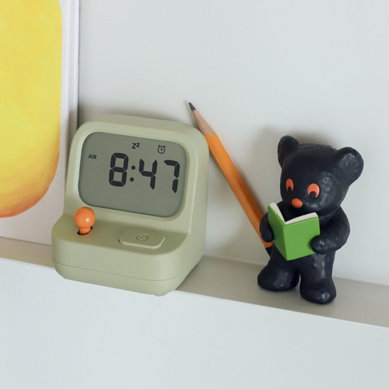Retro gaming console with alarm clock and timer function