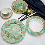 Elegant porcelain dinnerware set with gold accents