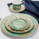 Elegant porcelain dinnerware set with gold accents