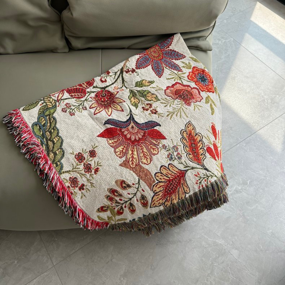Elegante Decke mit Floral Design und Rustikalen Fransen