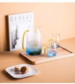 Elegant glass pitcher with matching drinking glass set