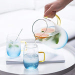 Blue glass jug set with matching drinking glass