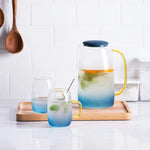 Elegant glass pitcher with matching drinking glass set