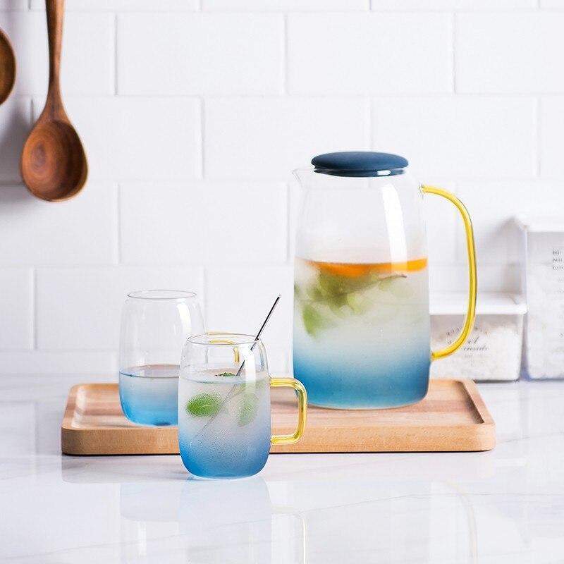 Elegant glass pitcher with matching drinking glass set