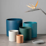 Elegant flower pot with saucer and drainage hole