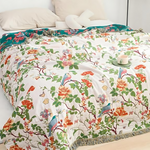 Reversible cotton blanket with botanical design