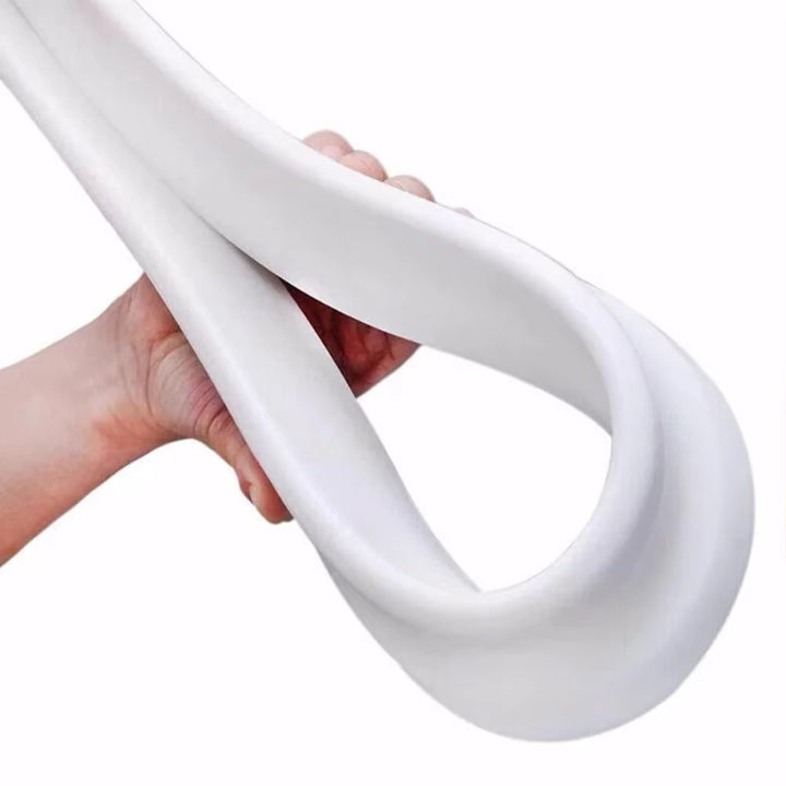 Flexible water barrier for showers